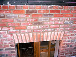 Some custom brickwork above a window opening. It hasn't yet been washed.